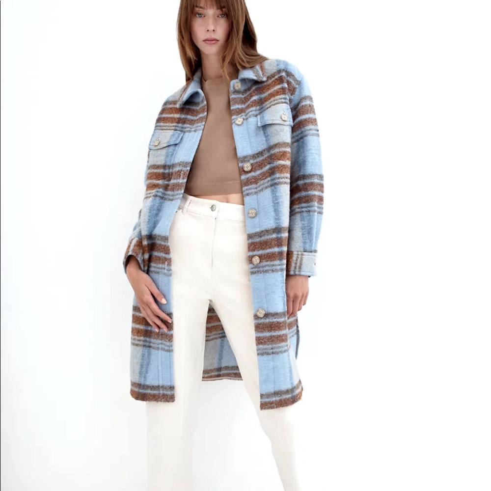 A long merino jacket in mint condition, worn handful of times